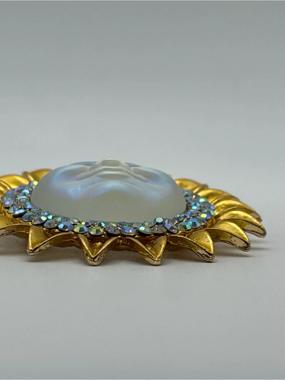 Iridescent Moon Face Sunburst Brooch with Aurora Rhinestones